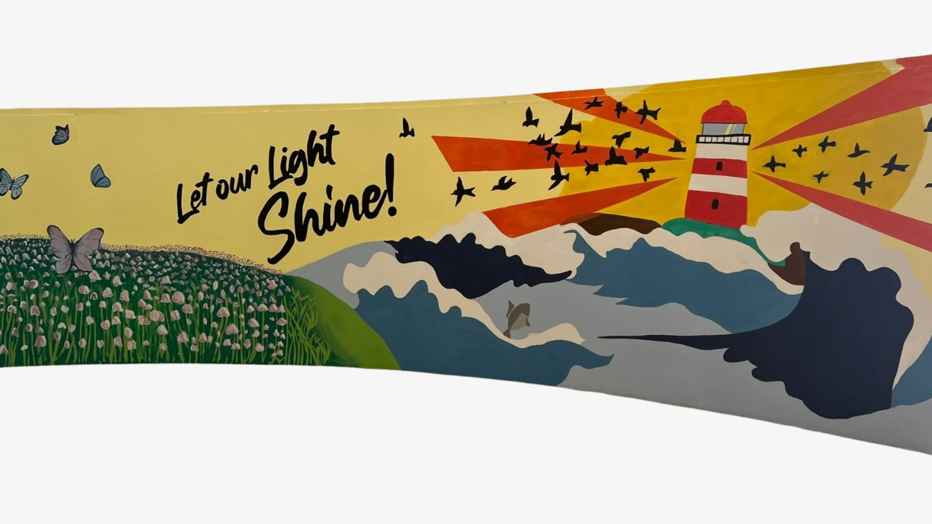 Colorful mural with text "Let our Light Shine!" featuring a lighthouse, birds, waves, butterflies, and a flower field.